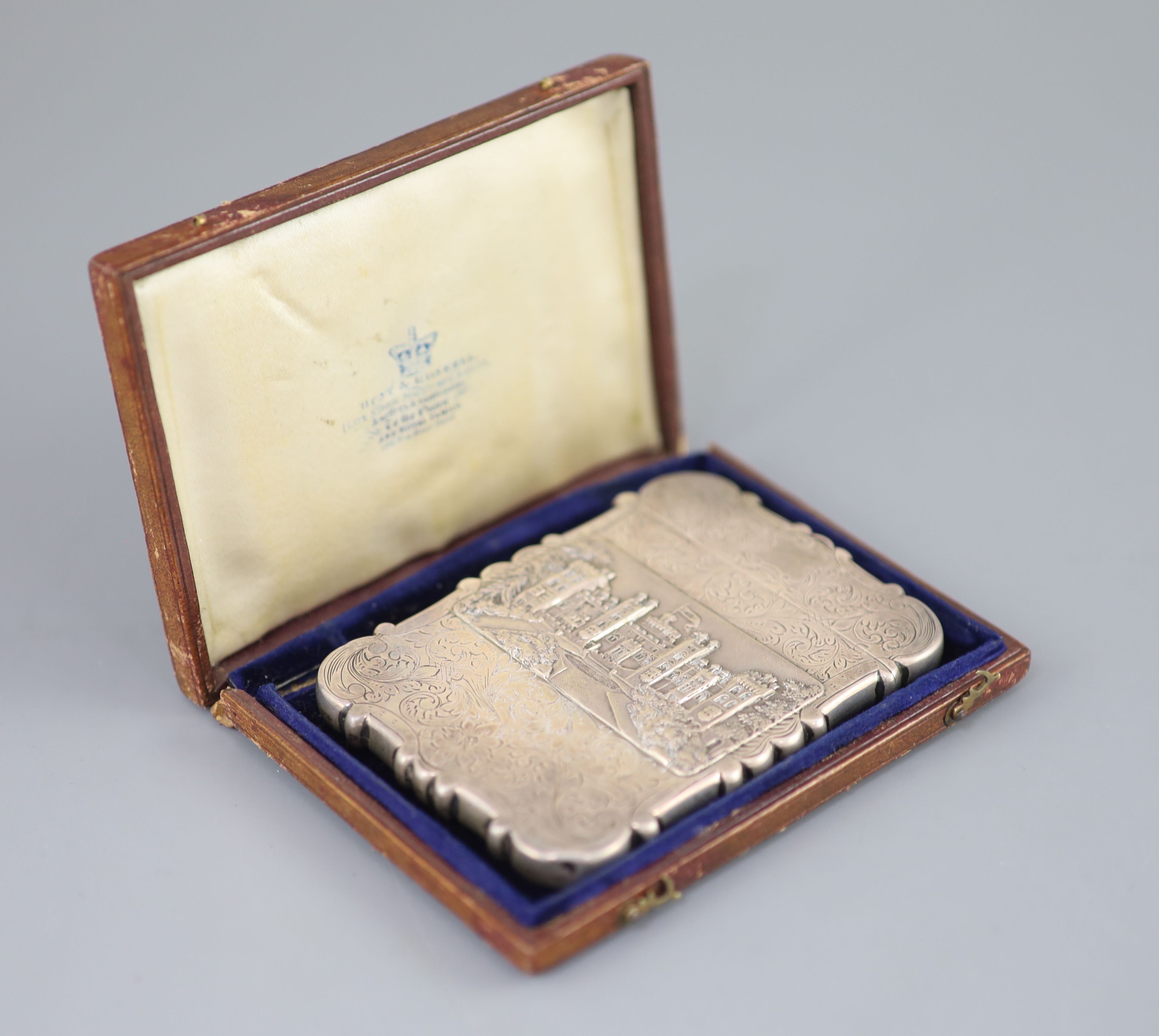 An early Victorian silver double sided castle top card case, depicting views of Windsor and Abbotsford castles,